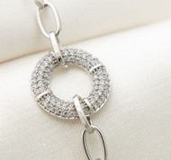 Bracciale in metallo con cristalli bianchi a forma di cerchio