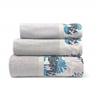 Set 3 asciugamani spugna Mora in cotone idrofilo con bordo decorativo.