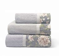 Set 3 asciugamani spugna Corolla in cotone idrofilo con bordo decorativo.