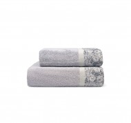 Set 2 asciugamani spugna Classic in cotone idrofilo con bordo decorativo.