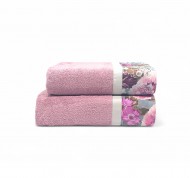 Set 2 asciugamani spugna Ricamo in cotone idrofilo con bordo decorativo.