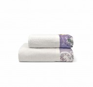 Set 2 asciugamani spugna Ramage in cotone idrofilo con bordo decorativo.